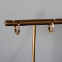 Celia Crystal Huggie Hoops