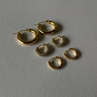 Celia Crystal Huggie Hoops